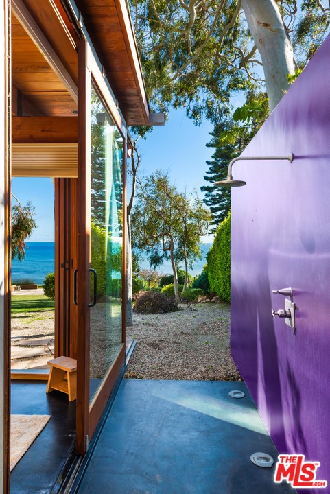 32496 Pacific Coast Highway Malibu, CA 90265 - Photo 34 of 51 a view of a porch with a yard