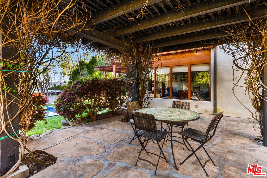 32496 Pacific Coast Highway Malibu, CA 90265 - Photo 47 of 51 a view of an outdoor space with a table and chairs