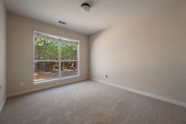 an empty room with window