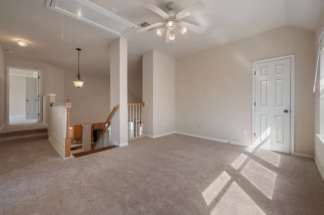 a view of a livingroom with a kitchen