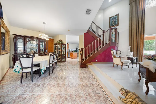 a bathroom with a sink a toilet and shower curtain