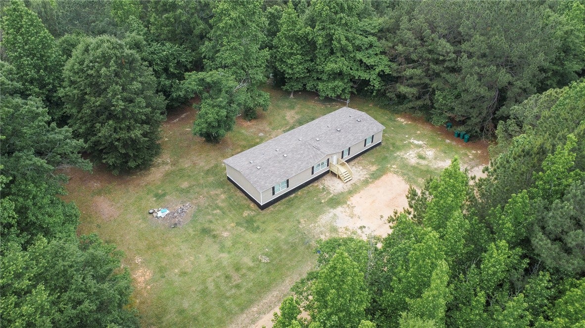 751 Ellis Road Shorter, AL 36075 - Photo 20 of 20 This tranquil woodland setting presents a welcoming, spacious residence.