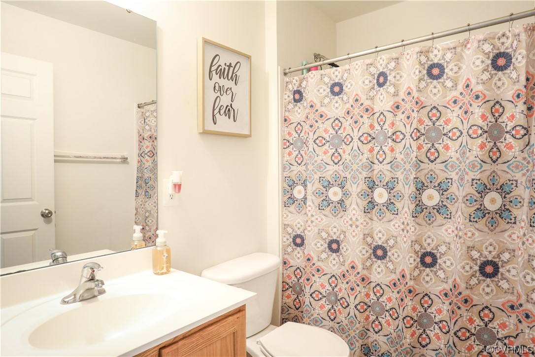 327 Rolkin Road Charlottesville, VA 22911 - Photo 13 of 18 a bathroom with a sink toilet and shower