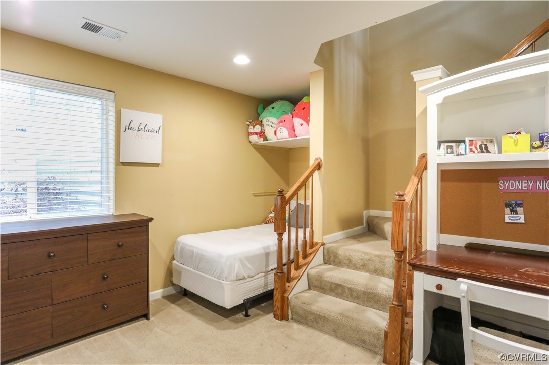 327 Rolkin Road Charlottesville, VA 22911 - Photo 14 of 18 a bedroom with a bed and a window