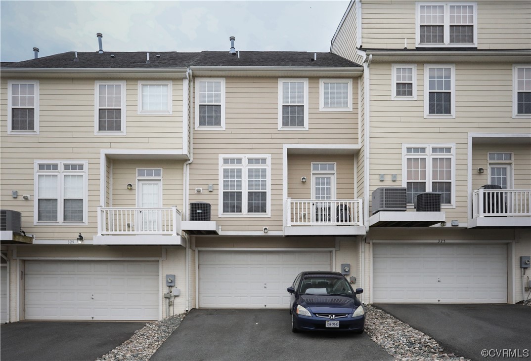 327 Rolkin Road Charlottesville, VA 22911 - Photo 17 of 18 a car parked in front of a building