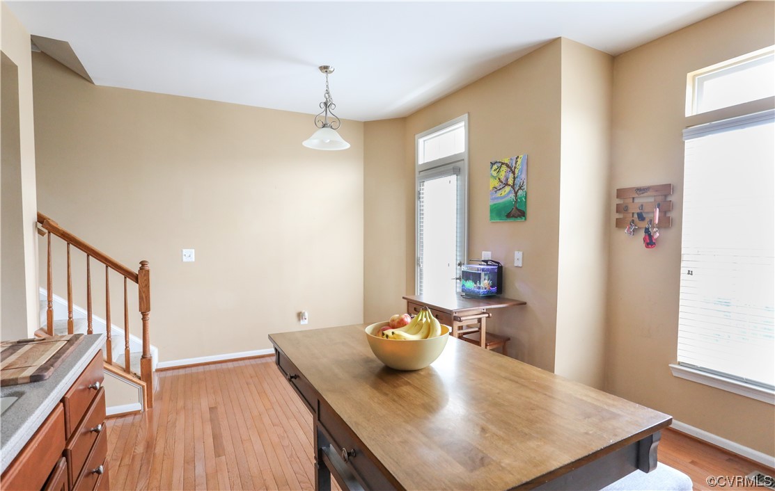327 Rolkin Road Charlottesville, VA 22911 - Photo 3 of 18 a view of a dining room with furniture and wooden floor