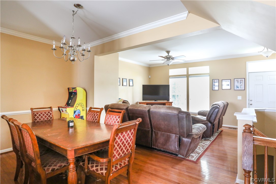 327 Rolkin Road Charlottesville, VA 22911 - Photo 4 of 18 a view of a dining room with furniture window and wooden floor