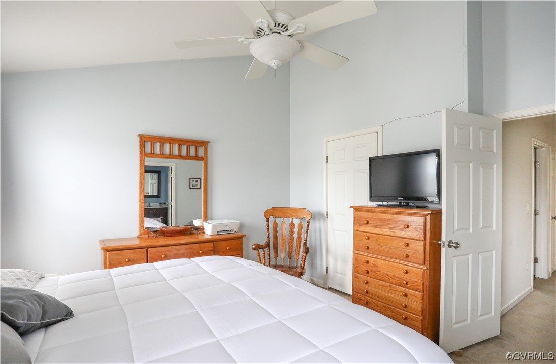 327 Rolkin Road Charlottesville, VA 22911 - Photo 8 of 18 a bedroom with furniture and a flat screen tv