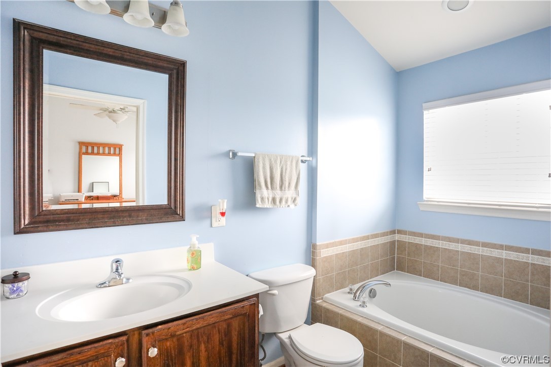 327 Rolkin Road Charlottesville, VA 22911 - Photo 9 of 18 a bathroom with a sink toilet and tub