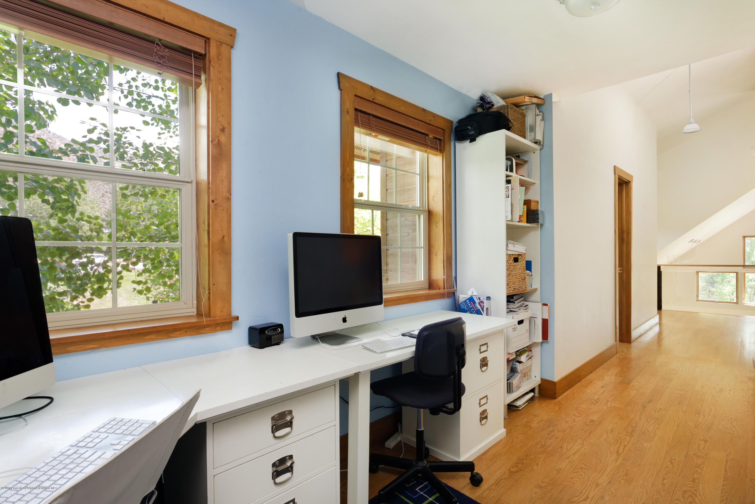 185 Riverside Drive Basalt, CO 81621 - Photo 15 of 34 a view of a workspace with furniture and a window