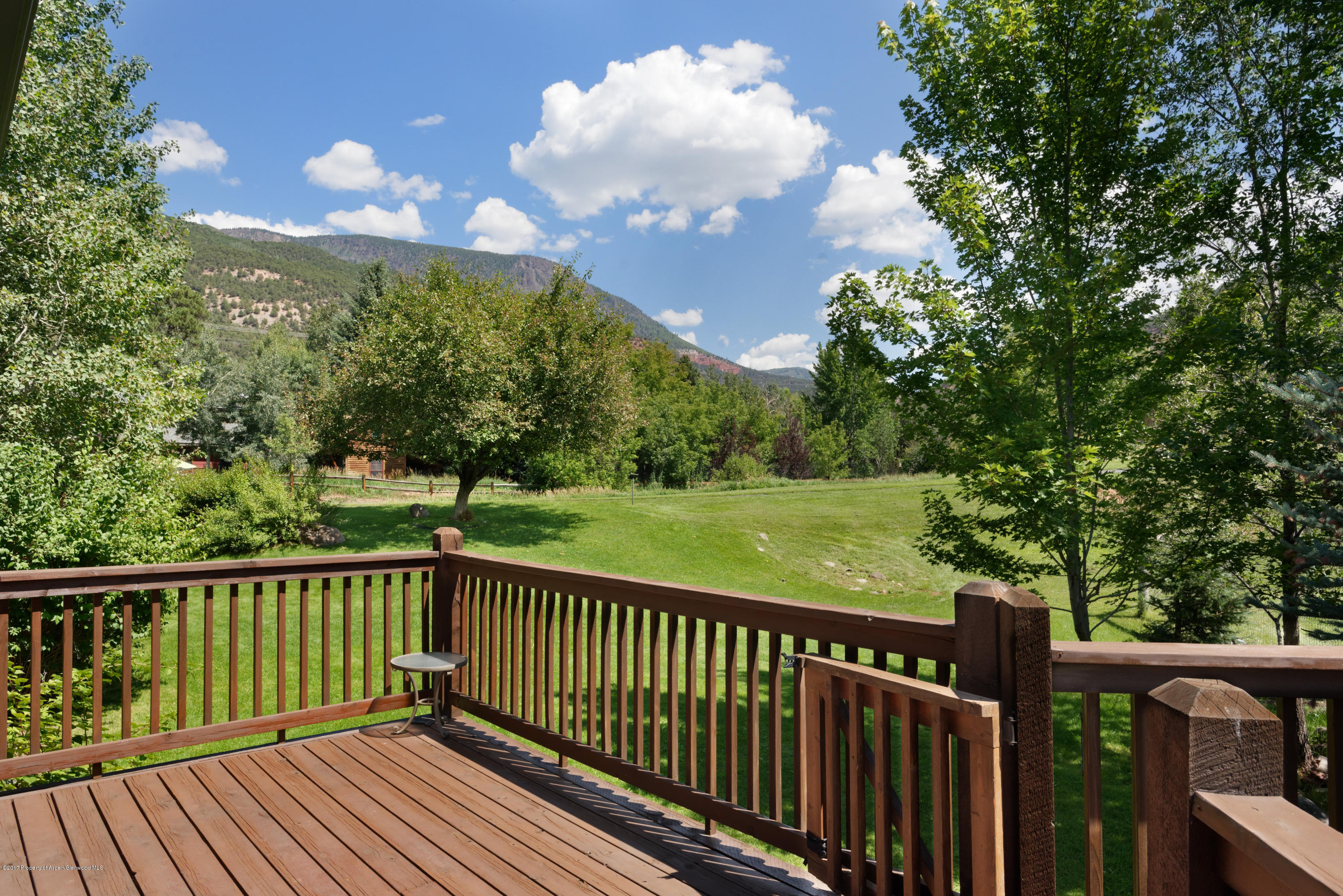 185 Riverside Drive Basalt, CO 81621 - Photo 20 of 34 a view of a balcony with wooden floor