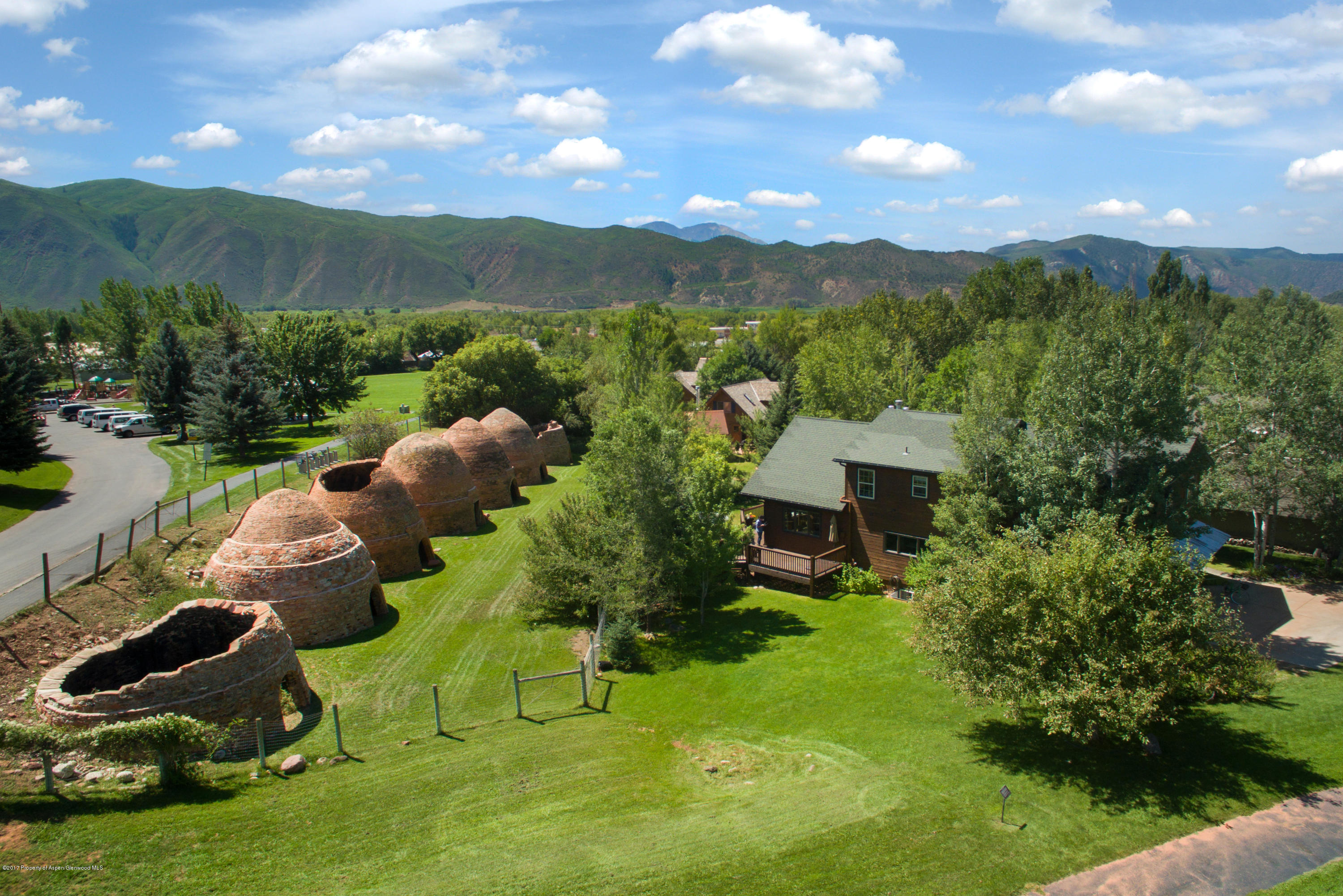 185 Riverside Drive Basalt, CO 81621 - Photo 22 of 34 a view of a garden with a houses