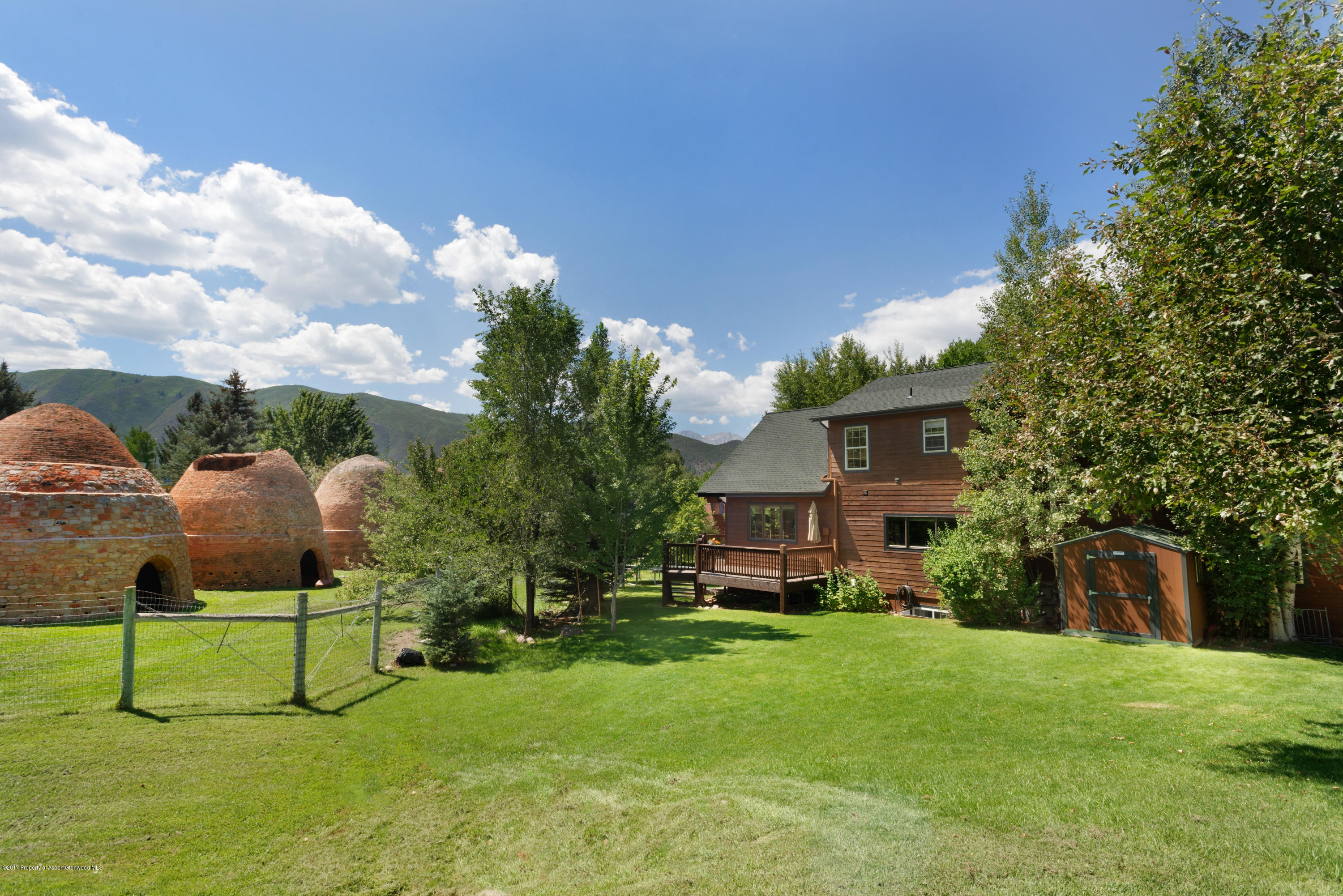 185 Riverside Drive Basalt, CO 81621 - Photo 25 of 34 a view of house with backyard