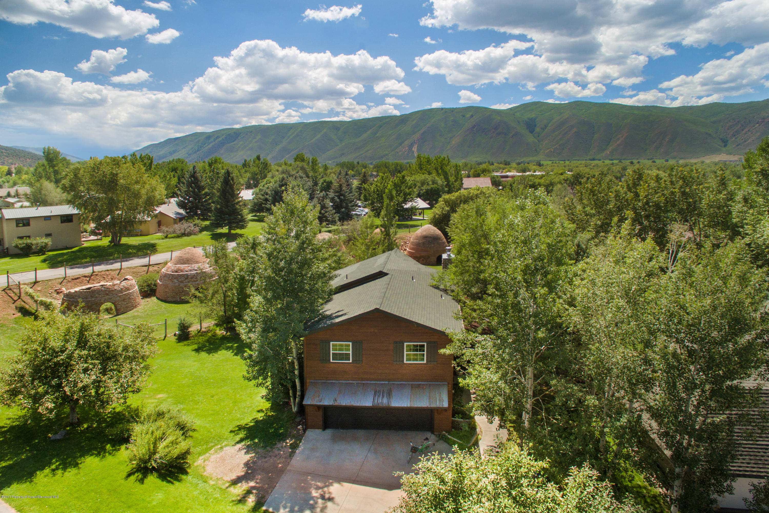 185 Riverside Drive Basalt, CO 81621 - Photo 28 of 34 a view of a city with a building in the background