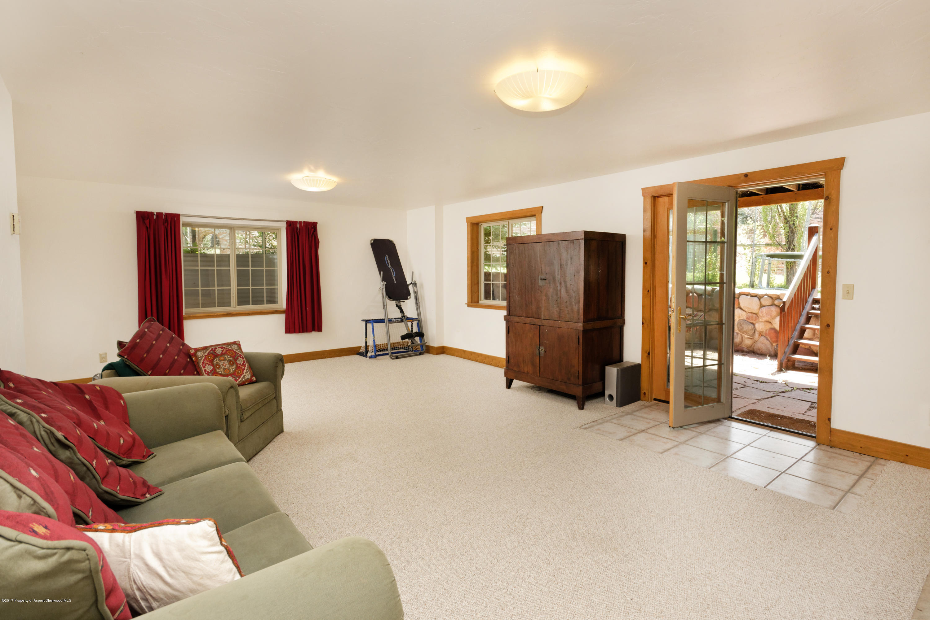 185 Riverside Drive Basalt, CO 81621 - Photo 33 of 34 a living room with furniture and a flat screen tv