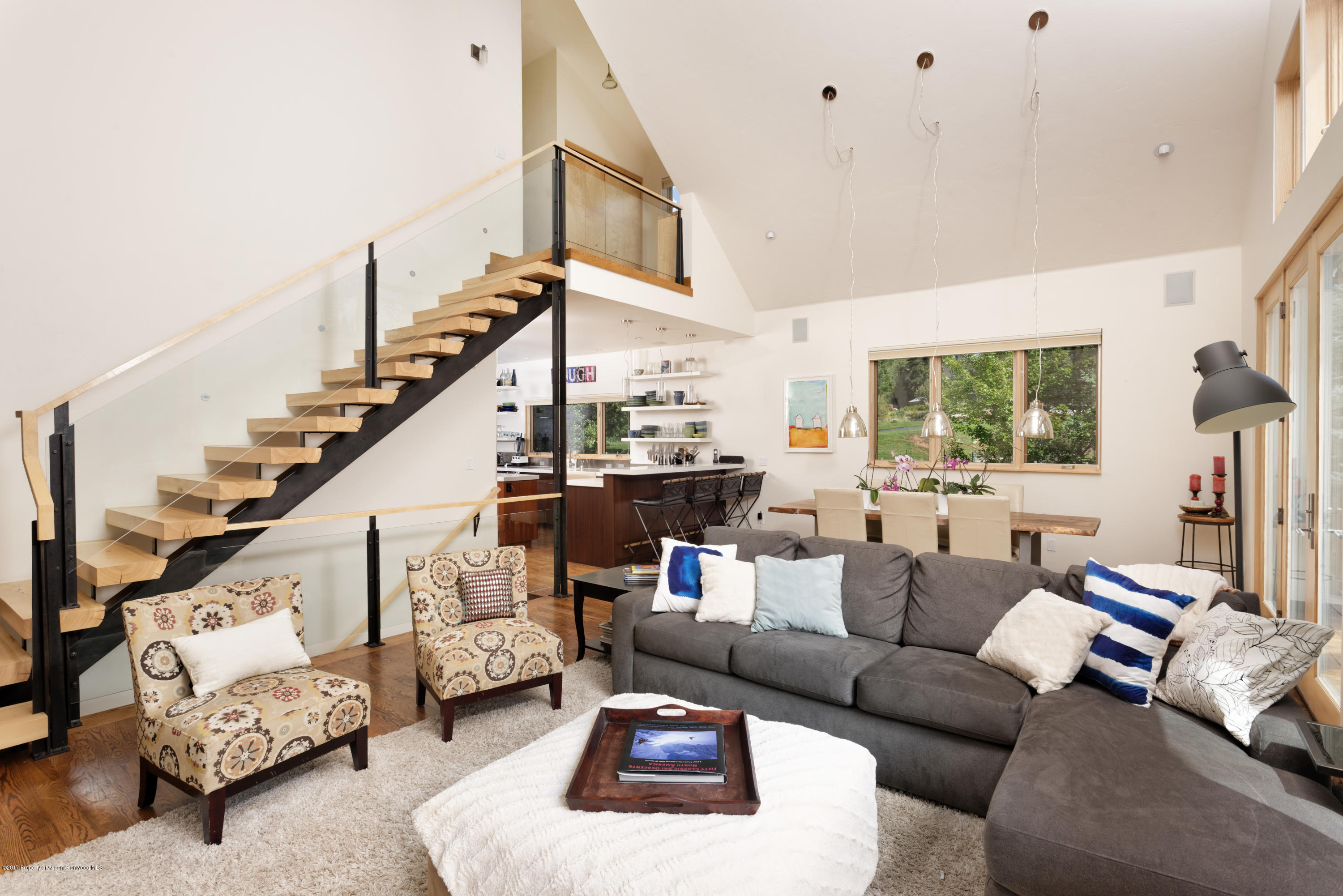 185 Riverside Drive Basalt, CO 81621 - Photo 5 of 34 a living room with furniture and a large window