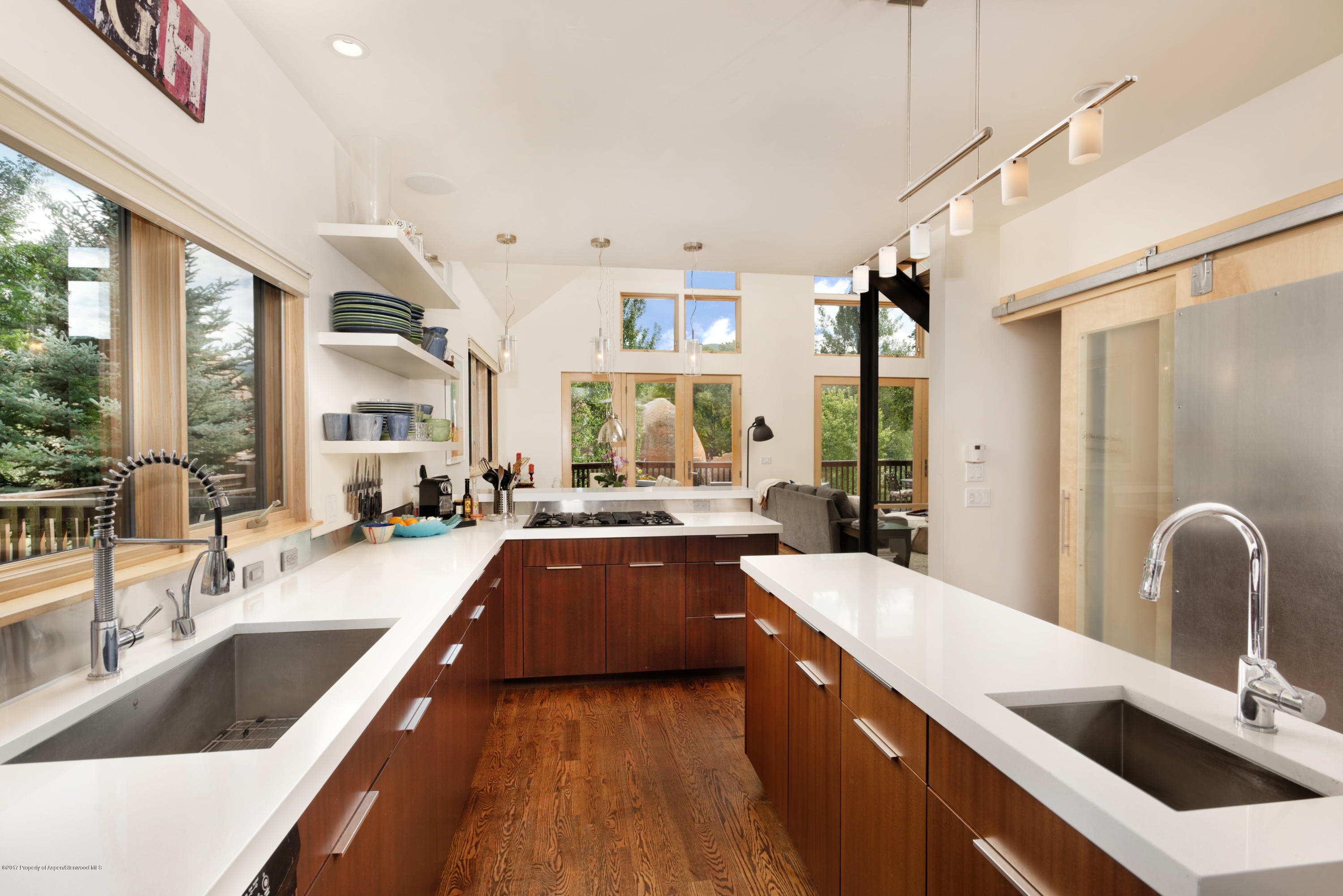 185 Riverside Drive Basalt, CO 81621 - Photo 8 of 34 a large kitchen with a large window and stainless steel appliances