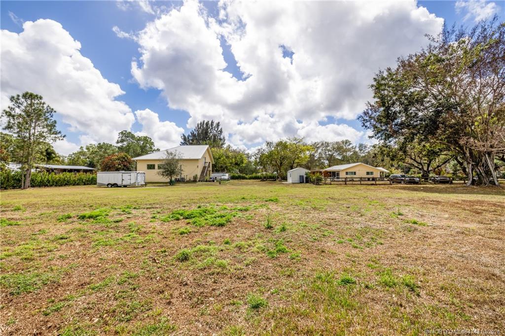 15848 129th Terrace North Jupiter, FL 33478 - Photo 13 of 52 a view of yard with green space
