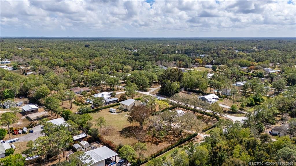 15848 129th Terrace North Jupiter, FL 33478 - Photo 15 of 52 an aerial view of a houses with a yard