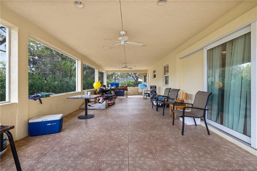 15848 129th Terrace North Jupiter, FL 33478 - Photo 33 of 52 a view of a livingroom with furniture and a window