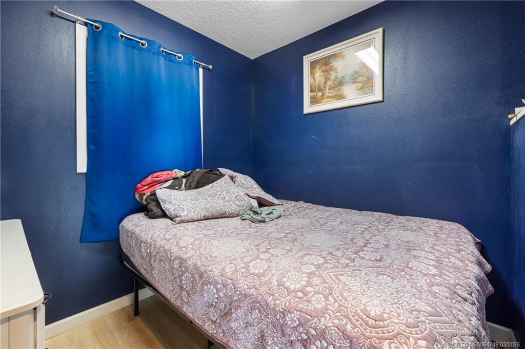 15848 129th Terrace North Jupiter, FL 33478 - Photo 37 of 52 a bedroom with a bed and a window