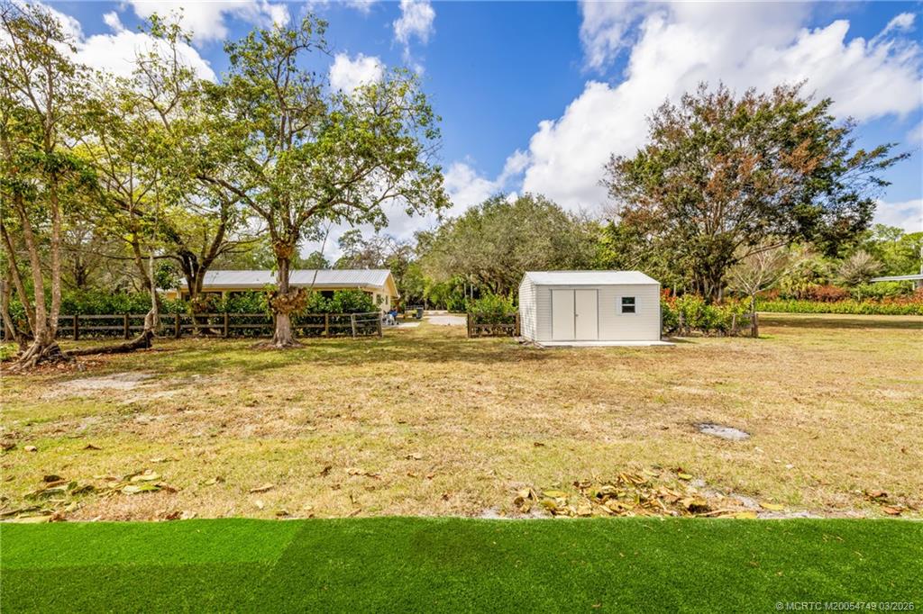 15848 129th Terrace North Jupiter, FL 33478 - Photo 10 of 52 a backyard of a house with lots of green space