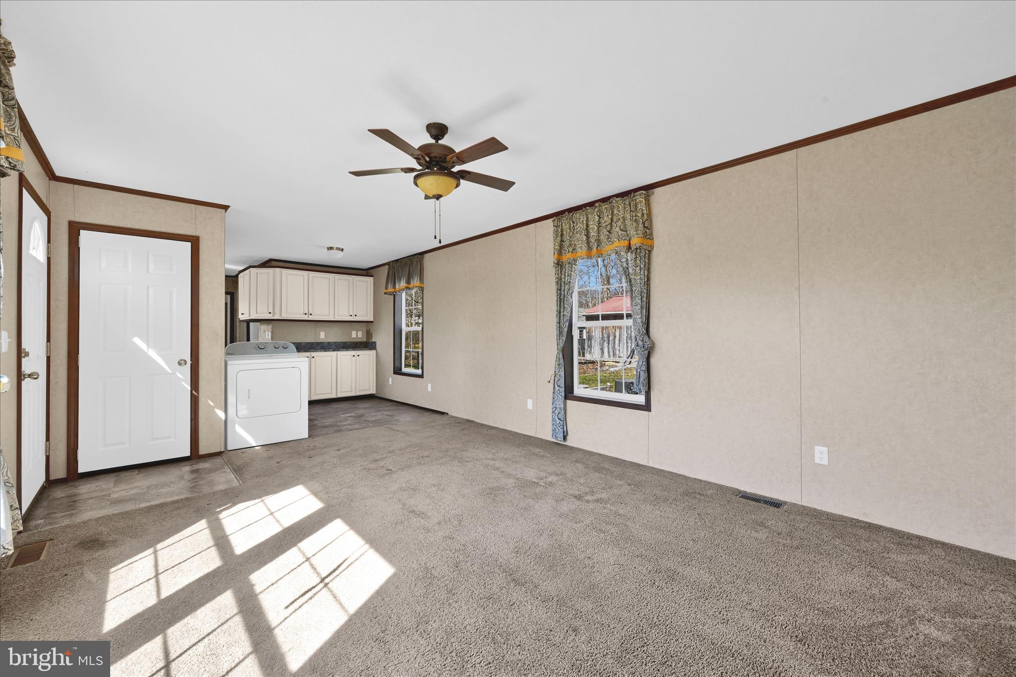 571 Schubert Road Bethel, PA 19507 - Photo 13 of 36 a view of livingroom with hardwood floor and a kitchen
