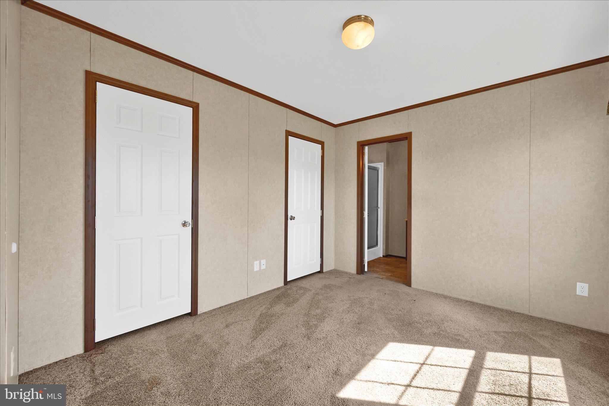 571 Schubert Road Bethel, PA 19507 - Photo 19 of 36 a view of empty room with windows