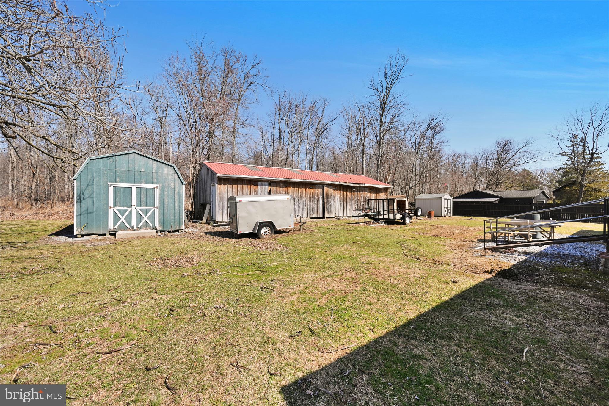 571 Schubert Road Bethel, PA 19507 - Photo 28 of 36 a front view of a house with a yard covered with snow