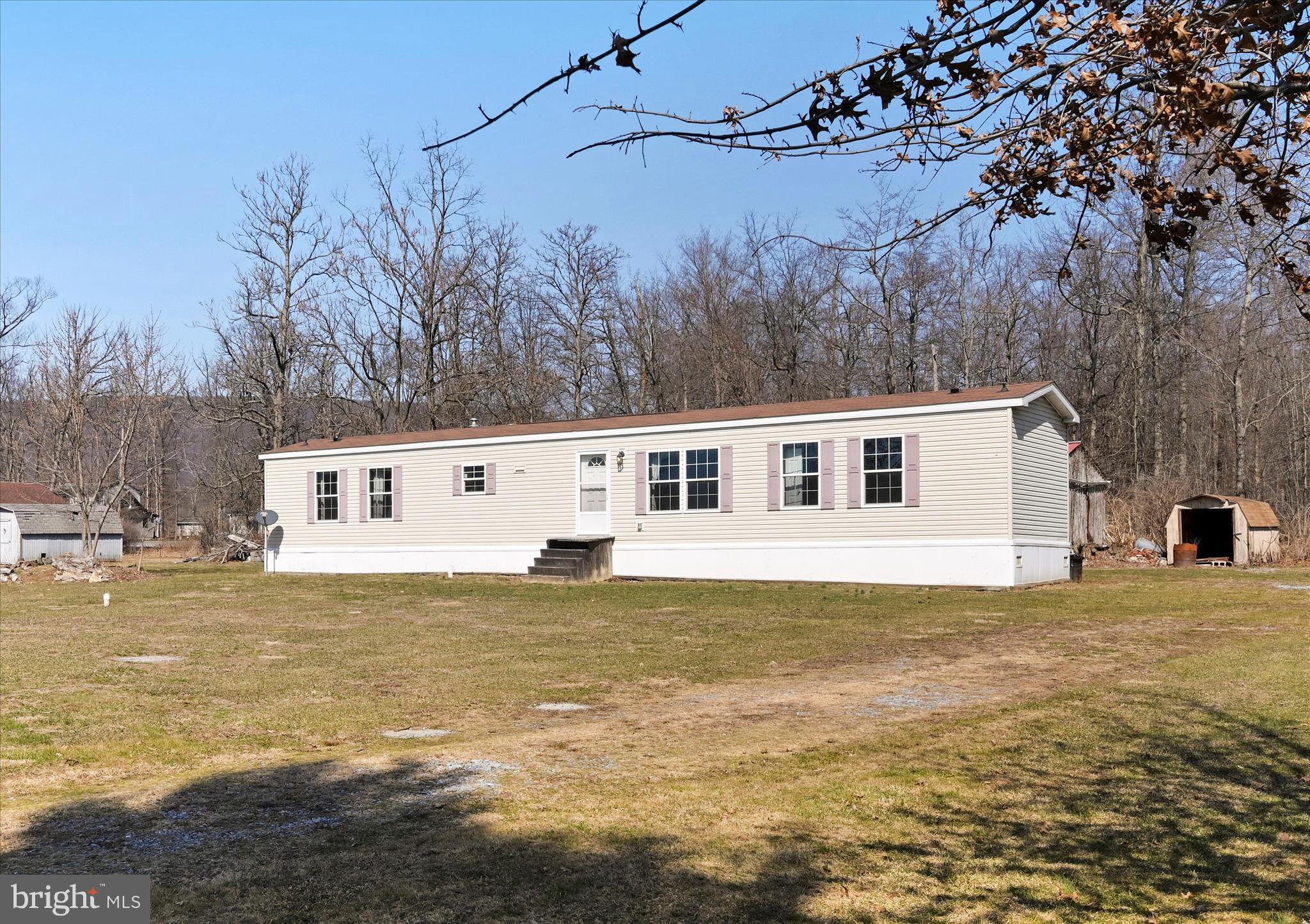 571 Schubert Road Bethel, PA 19507 - Photo 3 of 36 a view of a house with a yard