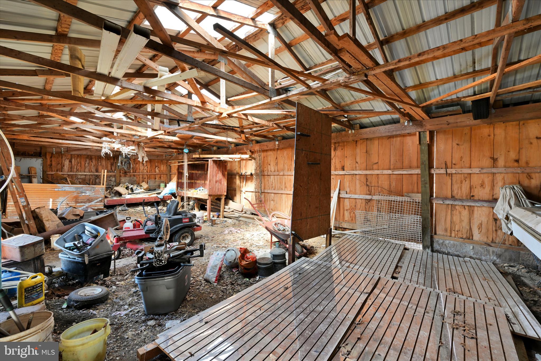 571 Schubert Road Bethel, PA 19507 - Photo 35 of 36 a view of a porch with wooden floor
