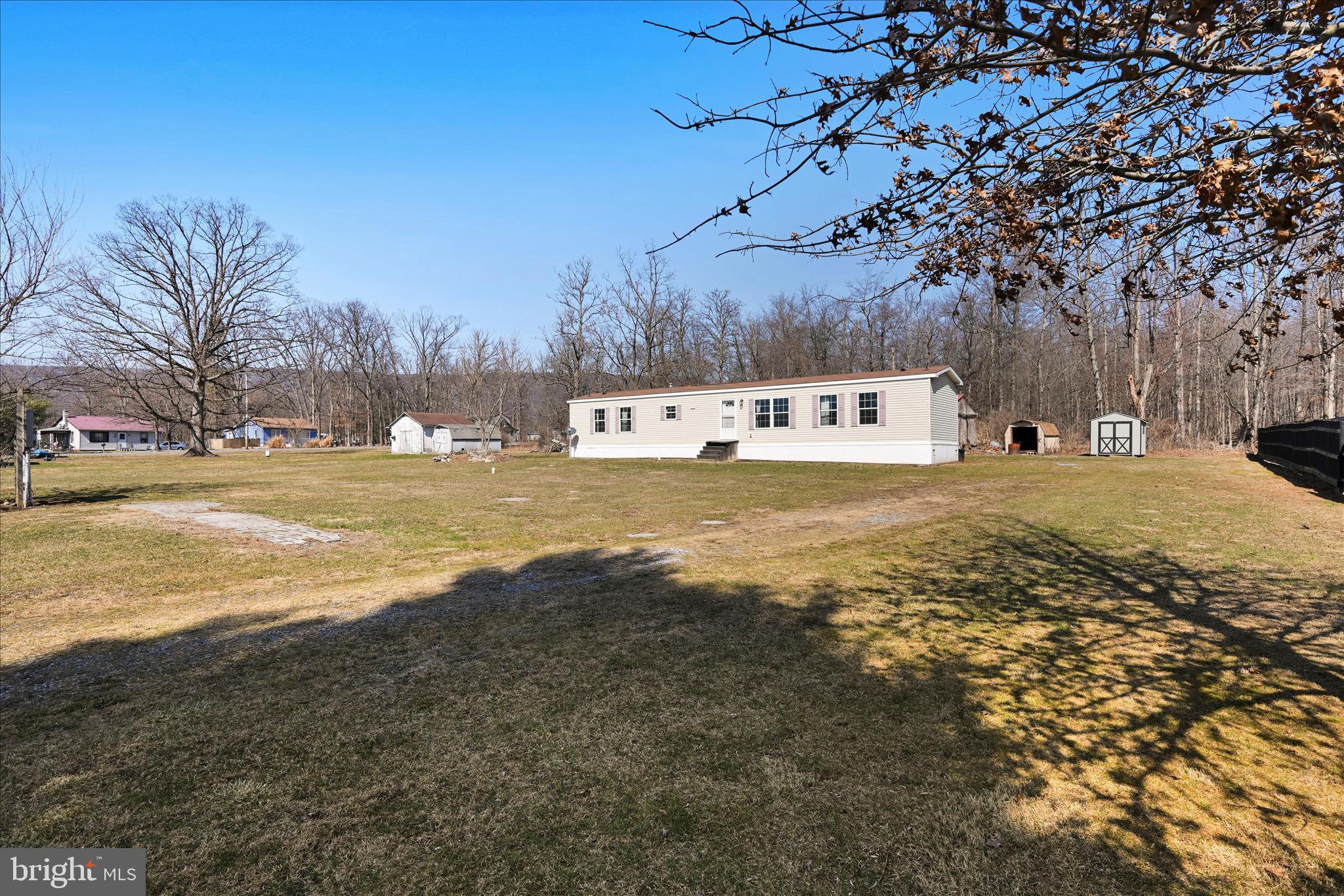 571 Schubert Road Bethel, PA 19507 - Photo 4 of 36 a view of a large body of water with water fall