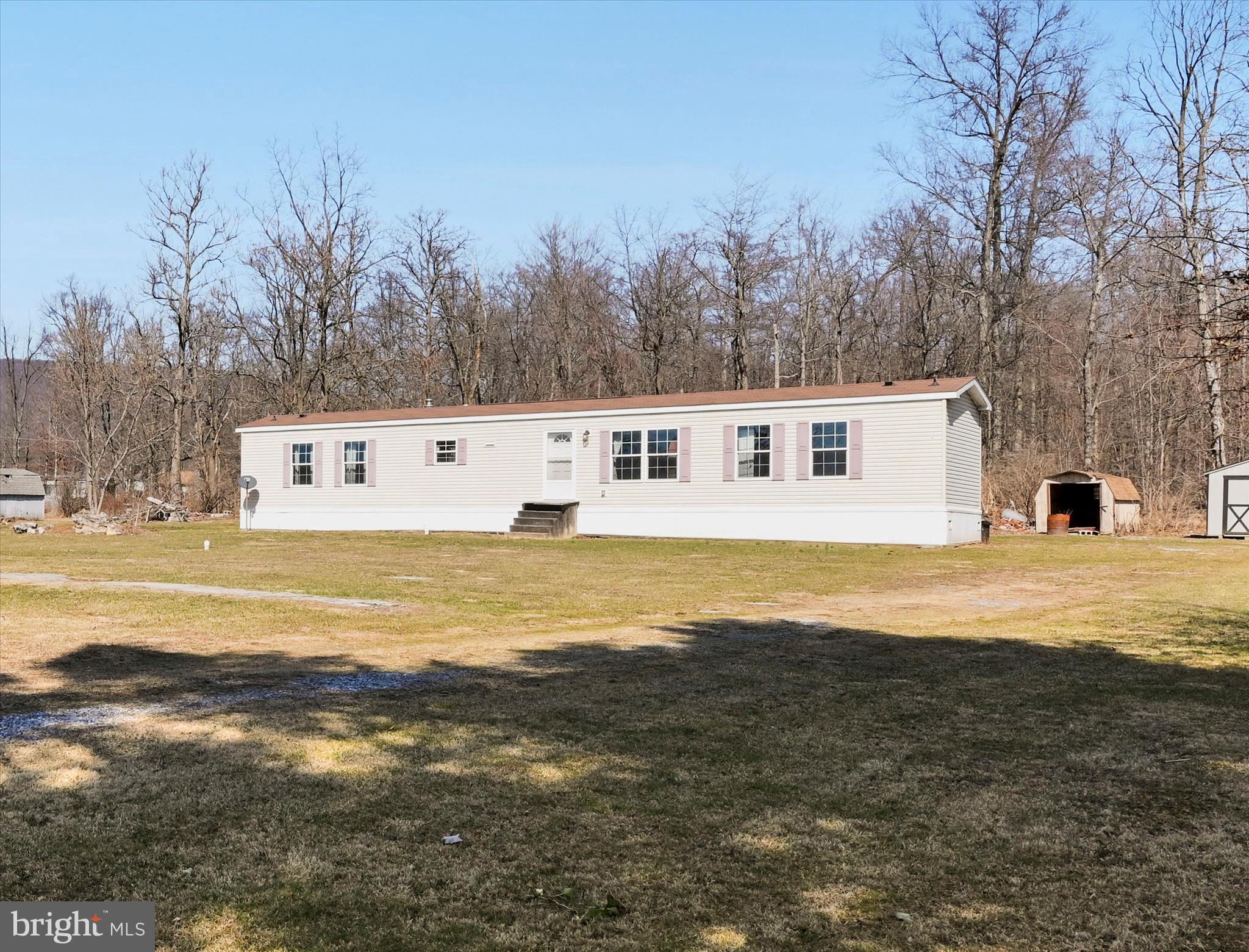 571 Schubert Road Bethel, PA 19507 - Photo 10 of 36 a view of a swimming pool with an outdoor space