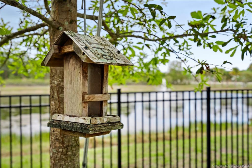3660 Magnolia Rdg Lane Palm City, FL 34990 - Photo 28 of 35 a view of a garden from a balcony
