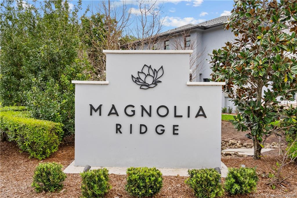 3660 Magnolia Rdg Lane Palm City, FL 34990 - Photo 35 of 35 a sign that is on the side of a building