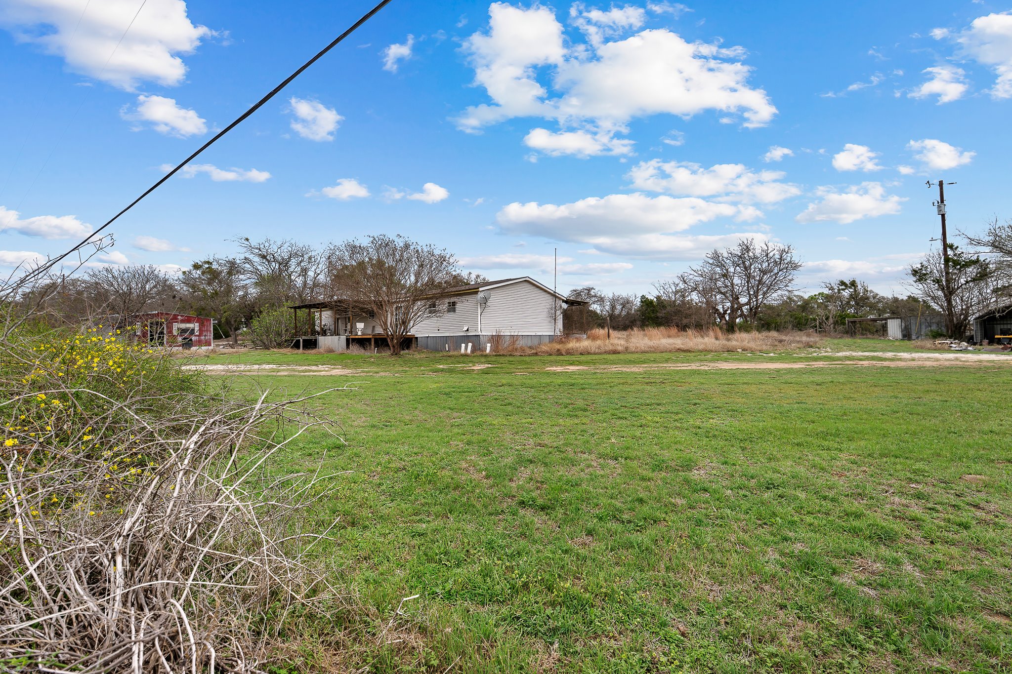 3035 County Road 255 Georgetown, TX 78633 - Photo 11 of 23 a view of outdoor space with garden and trees