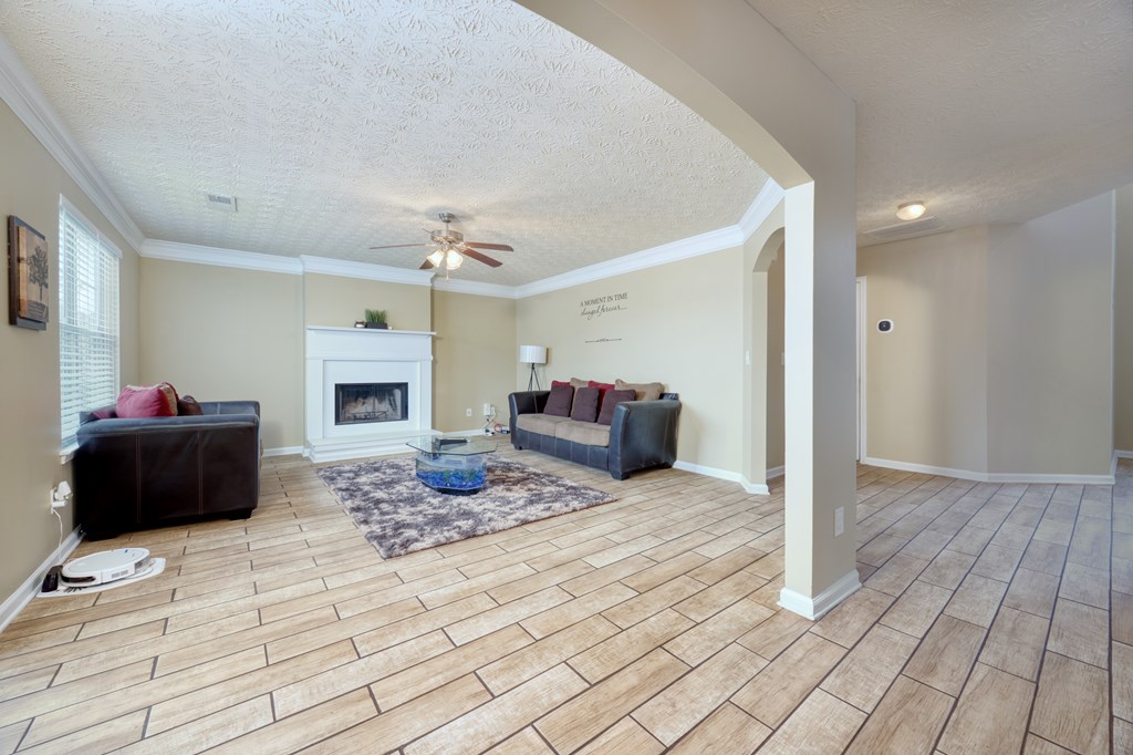 43 Ottawa Trail Fort Mitchell, AL 36856 - Photo 13 of 57 a living room with furniture and a fireplace