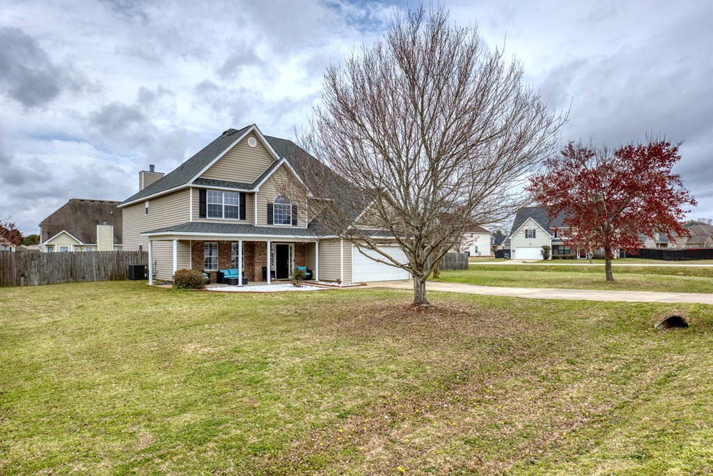43 Ottawa Trail Fort Mitchell, AL 36856 - Photo 2 of 57 a front view of a house with a yard