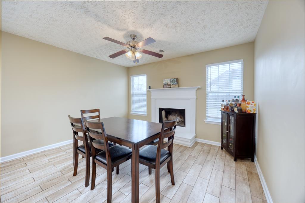 43 Ottawa Trail Fort Mitchell, AL 36856 - Photo 23 of 57 a view of a dining room with furniture and wooden floor