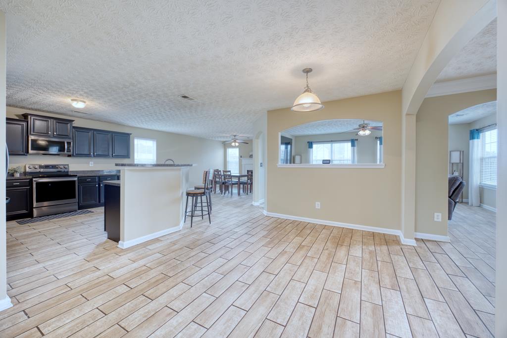43 Ottawa Trail Fort Mitchell, AL 36856 - Photo 26 of 57 a view of a kitchen with furniture and wooden floor