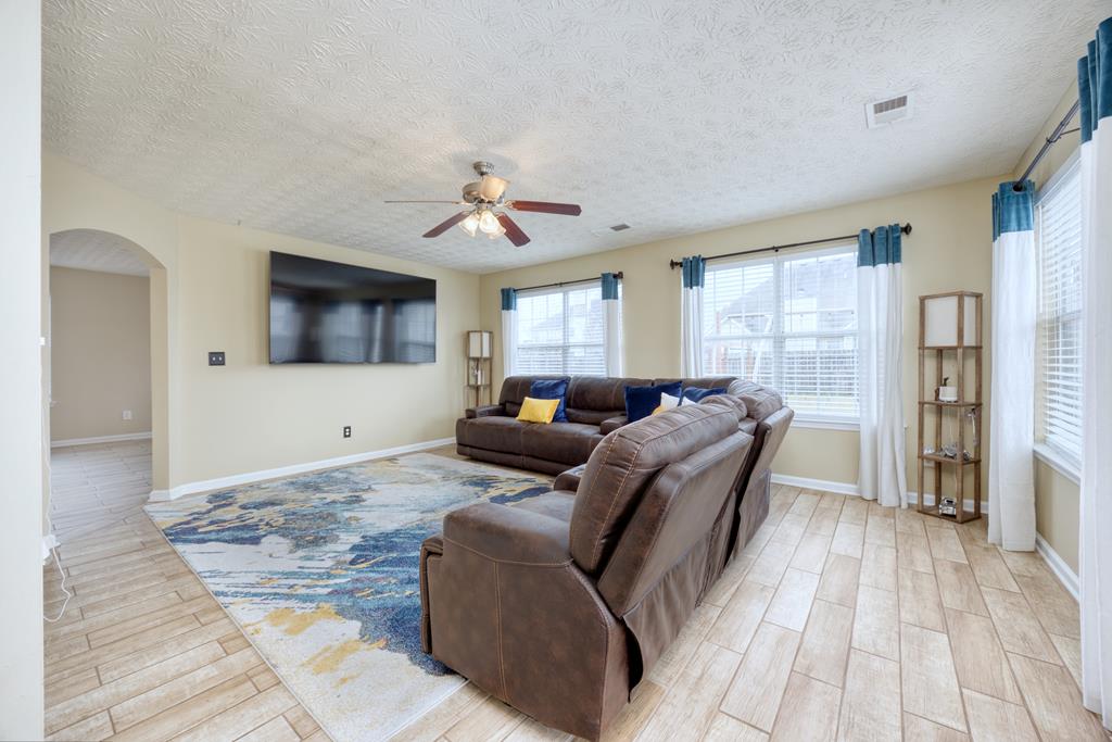 43 Ottawa Trail Fort Mitchell, AL 36856 - Photo 28 of 57 a living room with furniture and a flat screen tv