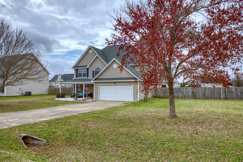 43 Ottawa Trail Fort Mitchell, AL 36856 - Photo 3 of 57 front view of a house with a yard