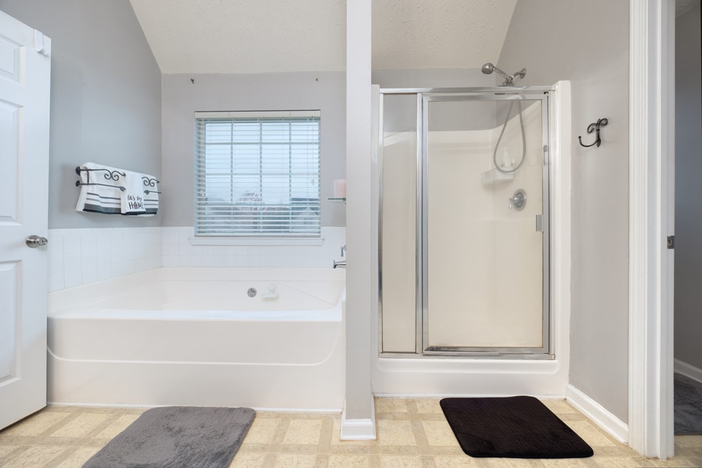 43 Ottawa Trail Fort Mitchell, AL 36856 - Photo 39 of 57 a bathroom with a bathtub and a shower
