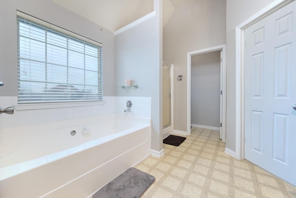 43 Ottawa Trail Fort Mitchell, AL 36856 - Photo 40 of 57 a bathroom with a bathtub and a shower