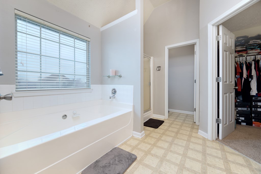 43 Ottawa Trail Fort Mitchell, AL 36856 - Photo 41 of 57 a bathroom with a bathtub and a shower