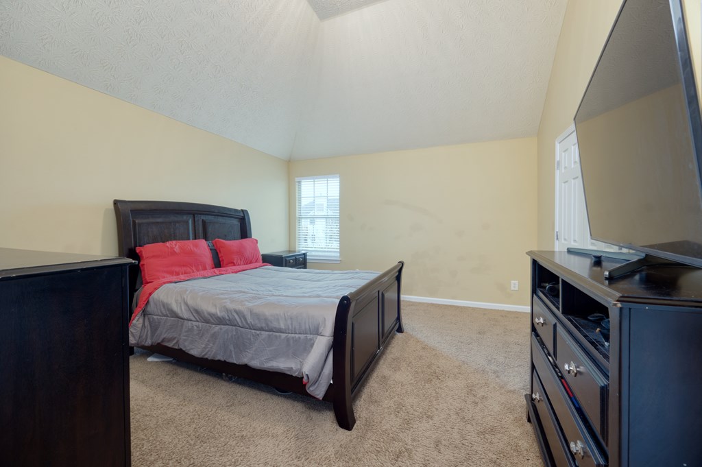 43 Ottawa Trail Fort Mitchell, AL 36856 - Photo 46 of 57 a bedroom with a bed and a desk