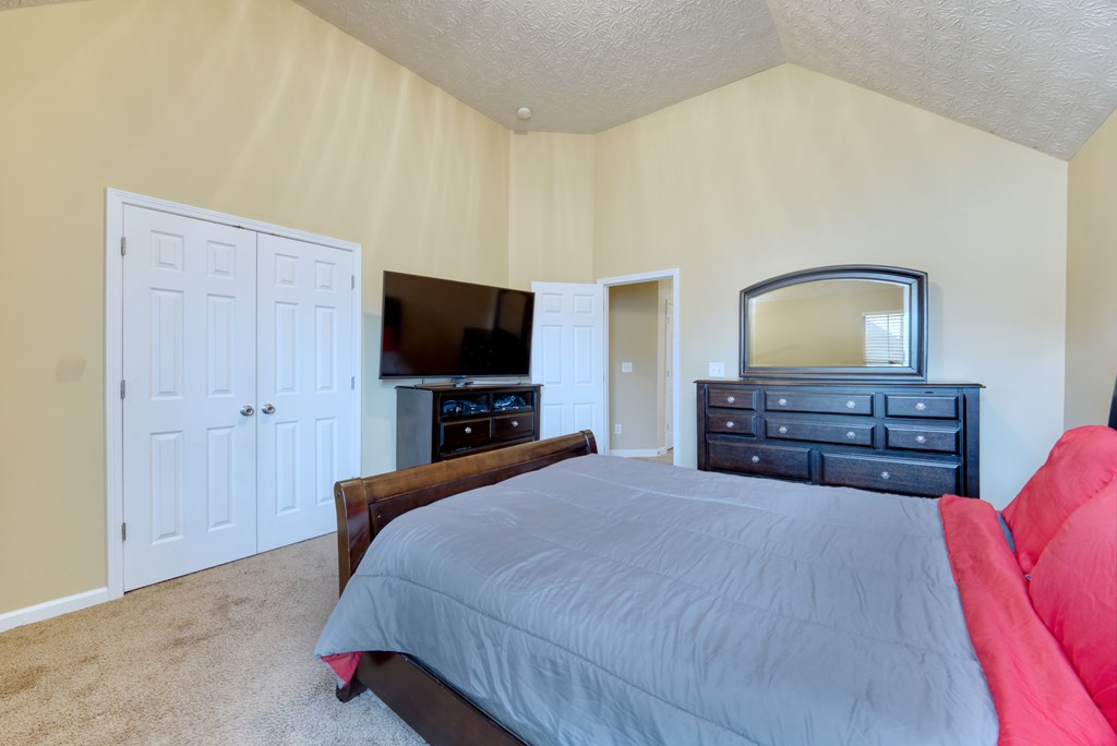 43 Ottawa Trail Fort Mitchell, AL 36856 - Photo 48 of 57 a bedroom with a bed and a television
