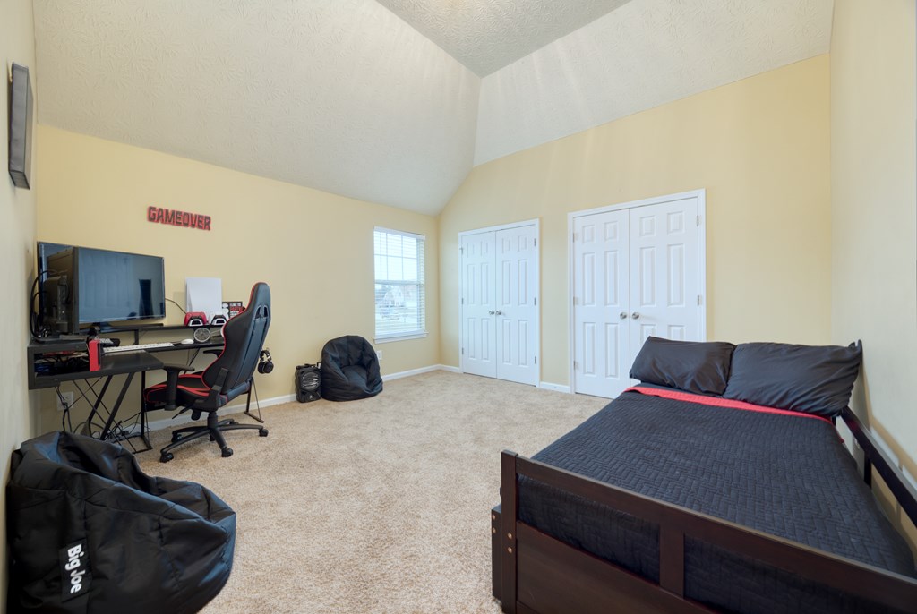 43 Ottawa Trail Fort Mitchell, AL 36856 - Photo 49 of 57 a bedroom with a bed and a desk