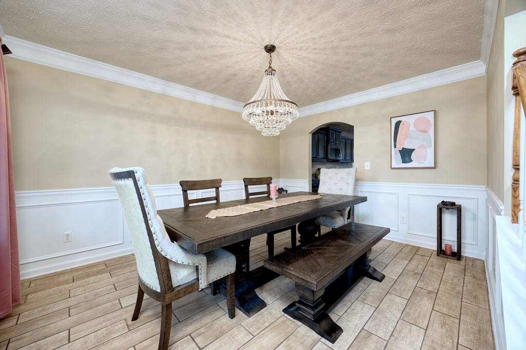 43 Ottawa Trail Fort Mitchell, AL 36856 - Photo 8 of 57 a view of a dining room with furniture and wooden floor