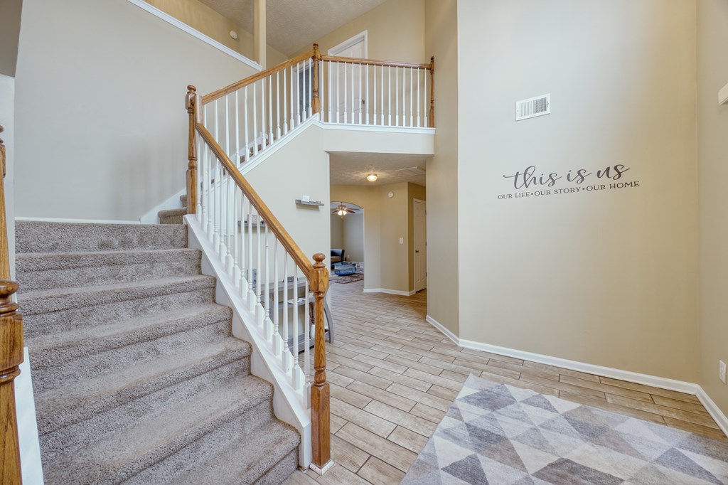 43 Ottawa Trail Fort Mitchell, AL 36856 - Photo 10 of 57 a view of staircase with railing and white walls
